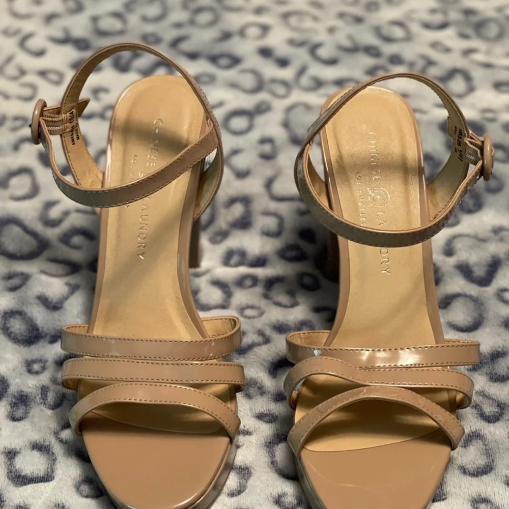 Strapy, Buckle on the side, tan heels. Great condition, only worn about 3 times.